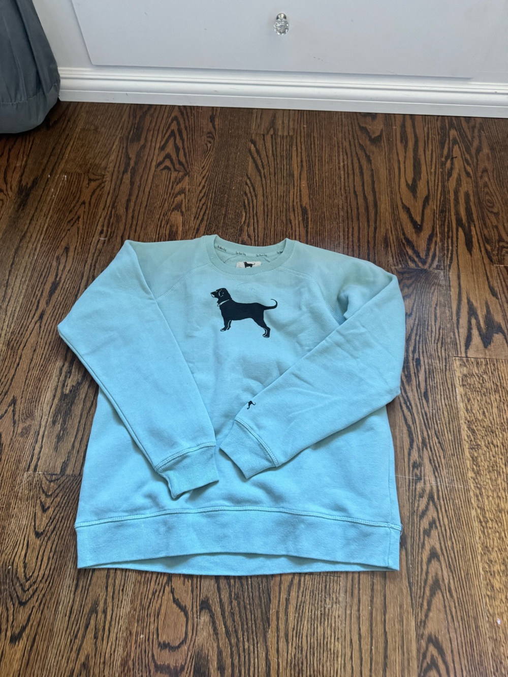 The Black Dog Light Blue Crewneck Sweatshirt with Black Dog Graphic